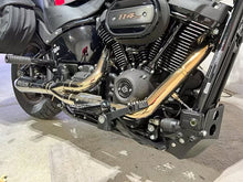 Load image into Gallery viewer, Stealth Pipes exhaust system installed on Harley M8 Softail – rear-side view of muffler and headers (2017–2025)