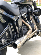 Load image into Gallery viewer, Harley M8 Softail motorcycle with Stealth Pipes exhaust – riding photo, stainless muffler upgrade for 2017–2025 models