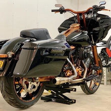 Load image into Gallery viewer, Stealth Pipes Short Bagger exhaust system – close-up rider side view on Harley touring motorcycle (1996–2016)