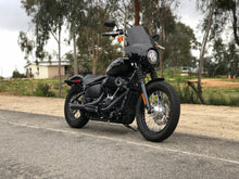 Load image into Gallery viewer, Stealth Pipes exhaust system installed on Harley M8 Softail – front-side view of muffler and headers (2017–2025)