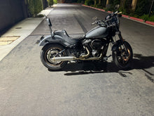 Load image into Gallery viewer, Stealth Pipes exhaust system installed on Harley M8 Softail – rear-side view of muffler and headers (2017–2025)