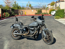 Load image into Gallery viewer, Stealth Pipes exhaust system installed on Harley M8 Softail – rear-side view of muffler and headers (2017–2025)