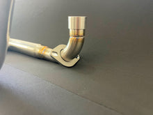 Load image into Gallery viewer, Honda Monkey with Stealth x Kruesi Originals exhaust system – rear angle showing stainless muffler