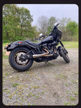 Load image into Gallery viewer, Stealth Pipes exhaust system installed on Harley M8 Softail – rear-side view of muffler and headers (2017–2025)