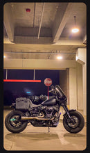 Load image into Gallery viewer, Stealth Pipes exhaust system installed on Harley M8 Softail – rear-side view of muffler and headers (2017–2025)