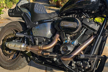 Load image into Gallery viewer, Stealth Pipes exhaust system installed on Harley M8 Softail – rear-side view of muffler and headers (2017–2025)