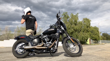 Load image into Gallery viewer, Stealth Pipes exhaust system installed on Harley M8 Softail – view of side (2017–2025)