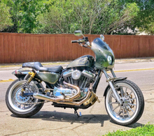 Load image into Gallery viewer, Harley Sportster motorcycle with Stealth Pipes exhaust system installed – American-made performance muffler