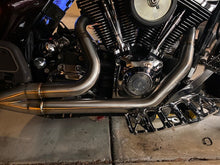 Load image into Gallery viewer, Stealth Pipes Short Bagger exhaust system – close-up rider side view on Harley touring motorcycle (1996–2016)