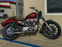 Load image into Gallery viewer, Harley Sportster motorcycle with Stealth Pipes exhaust system – rider lifestyle photo, 1986–2003 model