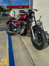 Load image into Gallery viewer, Harley Sportster motorcycle with Stealth Pipes exhaust system – rider lifestyle photo, 1986–2003 model